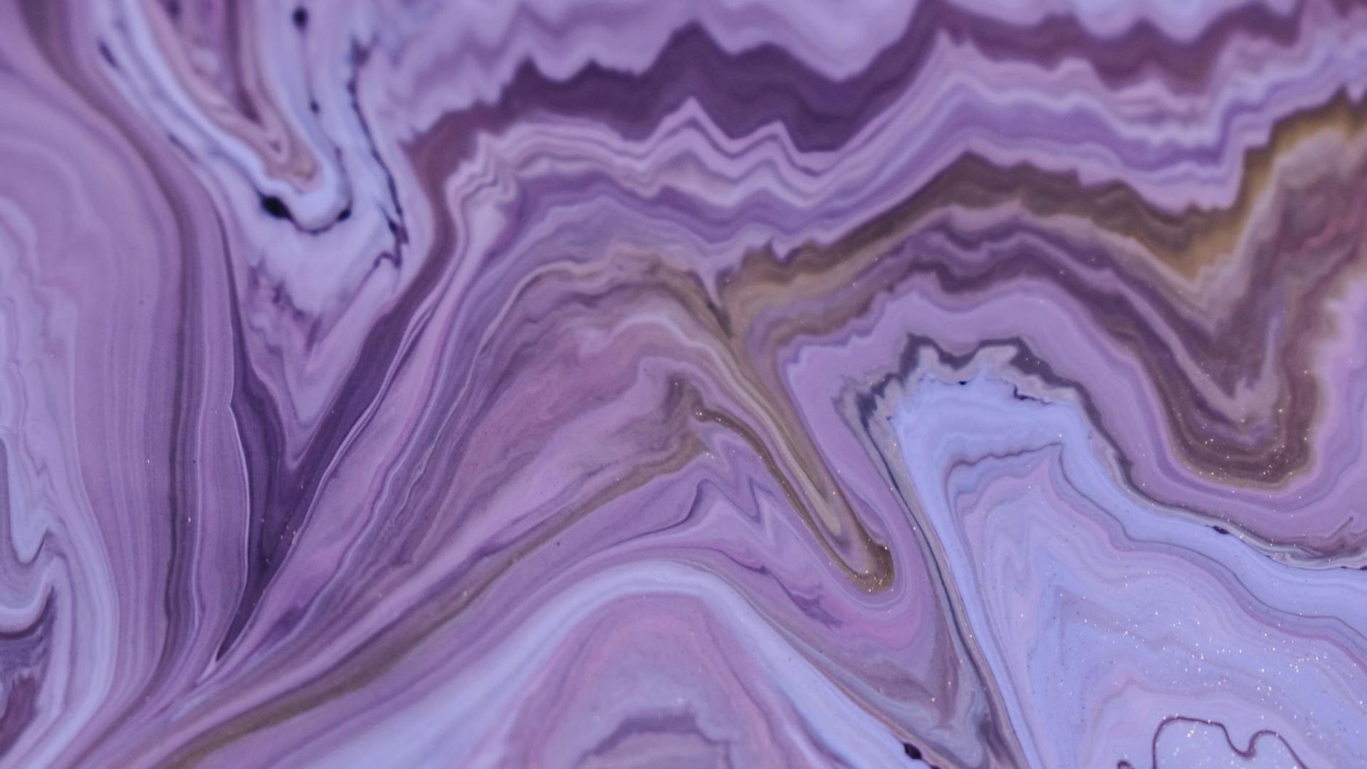 Abstract background with flowing lines of energy in violet tones.